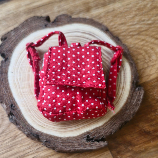 Red backpack dots