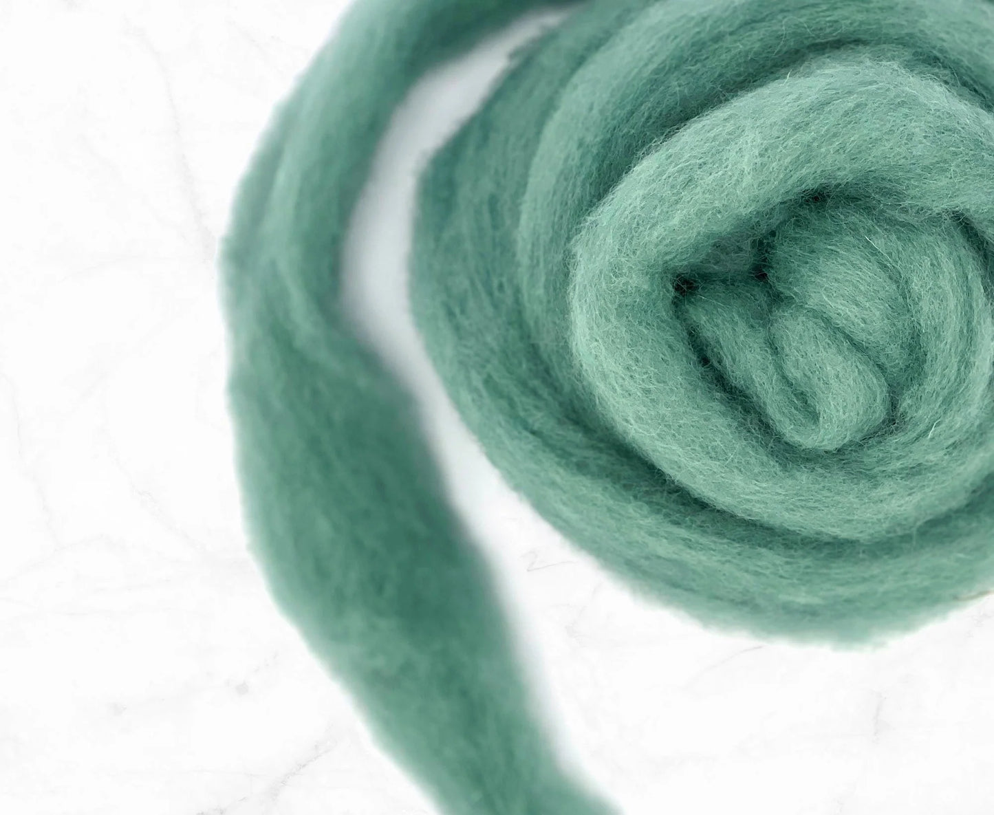 teal colourd wool carded